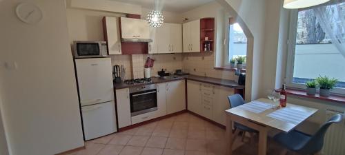 Cozinha, Apartament Żabi Kruk (Apartament Zabi Kruk) in Velho Subúrbio Cozinha, Apartament Żabi Kruk (Apartament Zabi Kruk) in Velho Subúrbio