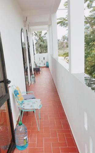 מרפסת, Maison d'hôtes Keur Racine (Maison d'hotes Keur Racine) in קאפ סקירינג מרפסת, Maison d'hôtes Keur Racine (Maison d'hotes Keur Racine) in קאפ סקירינג