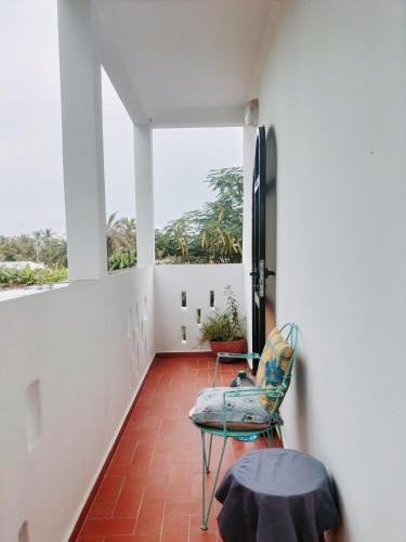 Erkély/terasz, Maison d'hôtes Keur Racine (Maison d'hotes Keur Racine) in Cap Skirring Erkély/terasz, Maison d'hôtes Keur Racine (Maison d'hotes Keur Racine) in Cap Skirring