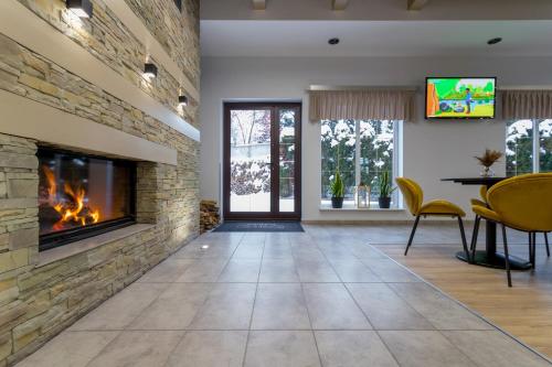 Спільний лаунж/ТБ зона, Pensjonat Sniezka SPA in Карпач Спільний лаунж/ТБ зона, Pensjonat Sniezka SPA in Карпач