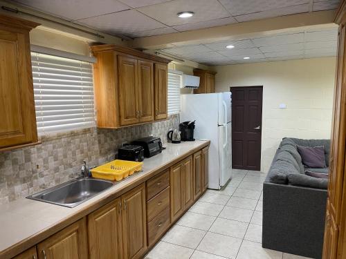 Kitchen, Arlene's Nest Diego Martin - 3 Bedroom 1 & half bath Cozy Apt in Diego Martin Kitchen, Arlene's Nest Diego Martin - 3 Bedroom 1 & half bath Cozy Apt in Diego Martin