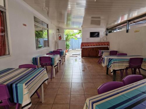 Ruang bersama/area TV, HIME LODGE in Tahiti Ruang bersama/area TV, HIME LODGE in Tahiti