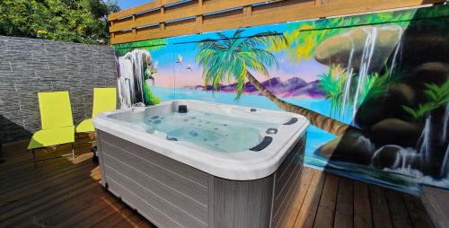 poreamme, "Chez Claudia "charmant logement avec jacuzzi privatif en toute intimite sur belle terrasse exterieu in Saint Francois poreamme, "Chez Claudia "charmant logement avec jacuzzi privatif en toute intimite sur belle terrasse exterieu in Saint Francois