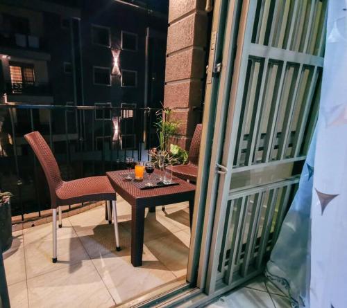 Μπαλκόνι/βεράντα, Lima's Vacation 1BR Apt with Wi-Fi & Netflix in Kampala, Namugongo road in Namugongo Μπαλκόνι/βεράντα, Lima's Vacation 1BR Apt with Wi-Fi & Netflix in Kampala, Namugongo road in Namugongo