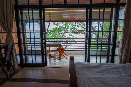 Nakorn River View Guesthouse, Restaurant and Caf`e in Champasak Nakorn River View Guesthouse, Restaurant and Caf`e in Champasak