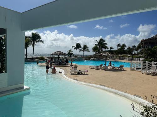 Swimming pool, Promo ! Studio Relax Manganao A Deux Pas de la Plage, Piscine Incluse ! in Saint Francois Swimming pool, Promo ! Studio Relax Manganao A Deux Pas de la Plage, Piscine Incluse ! in Saint Francois