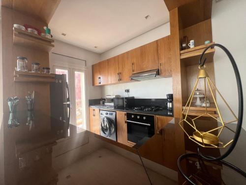 Kitchen, Luxury Apart 2 CH -CASA FINANCE CITY in El Oulfa Kitchen, Luxury Apart 2 CH -CASA FINANCE CITY in El Oulfa