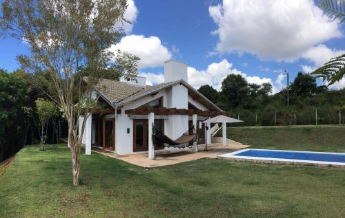 Úszómedence, Casa de campo com piscina in Jaguariaiva Úszómedence, Casa de campo com piscina in Jaguariaiva