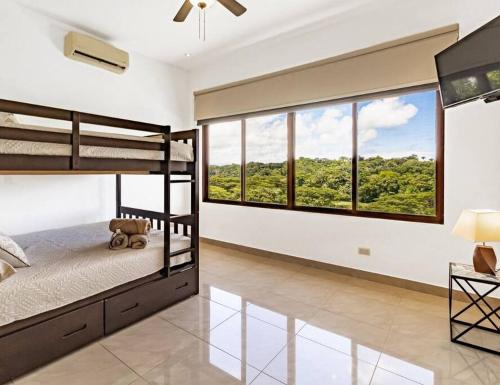 客房, Villa blanca en Esterillos con piscina in 埃斯特里約斯埃斯特 客房, Villa blanca en Esterillos con piscina in 埃斯特里約斯埃斯特