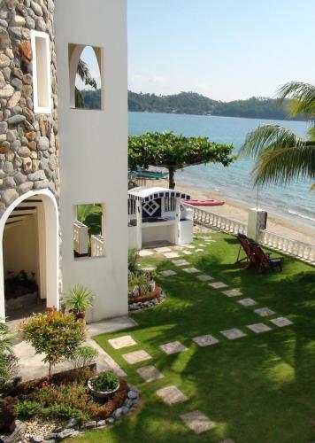 Entrance, Squares Beachfront Apartments near Aninuan Falls Entrance, Squares Beachfront Apartments near Aninuan Falls