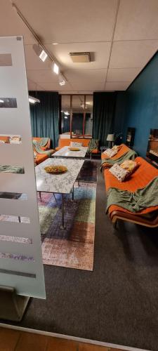 Közös társalgó / TV, Hotell Tre Systrar in Eskilstuna Közös társalgó / TV, Hotell Tre Systrar in Eskilstuna