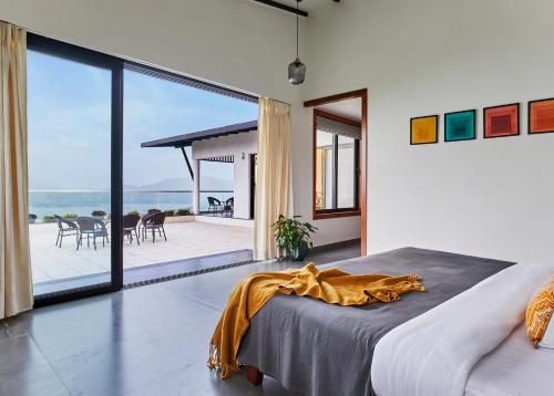 Balcony/terrace, SaffronStays Ahilya Waters by Kisha Villas, Pawna - pool villa with 270º Pawna lake view in Kolechafesar Balcony/terrace, SaffronStays Ahilya Waters by Kisha Villas, Pawna - pool villa with 270º Pawna lake view in Kolechafesar