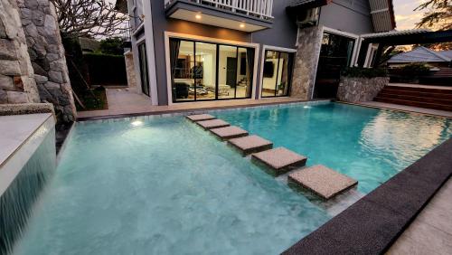 Swimming pool, I am pool villa Pattaya no.11 in Takiantia Swimming pool, I am pool villa Pattaya no.11 in Takiantia