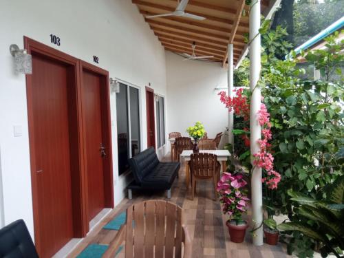 Balcony/terrace, Thoddoo Garden inn in Alifu Alifu Atoll Balcony/terrace, Thoddoo Garden inn in Alifu Alifu Atoll