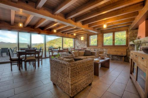 gedeelde lounge/tv-ruimte, Apartaments El Tossalet in Bonansa gedeelde lounge/tv-ruimte, Apartaments El Tossalet in Bonansa