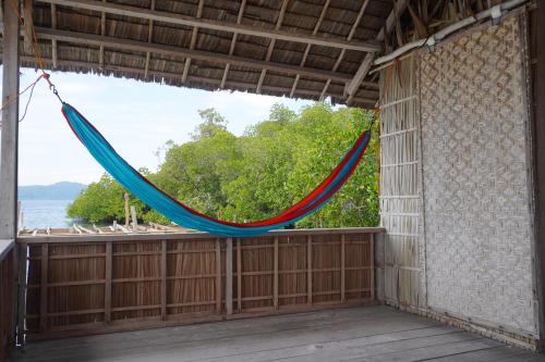 balcon/terrasse, Pesona Papua Homestay in Gam balcon/terrasse, Pesona Papua Homestay in Gam