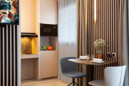 Kitchen, Citadines La Défense Paris in Paris Kitchen, Citadines La Défense Paris in Paris