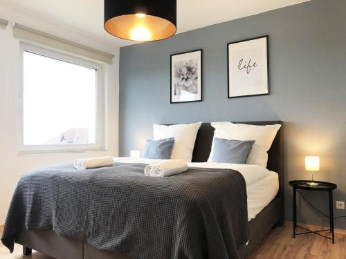 Gostinjska soba, LIME HOMES: Balkon, Kuche, Netflix in Barsinghausen Gostinjska soba, LIME HOMES: Balkon, Kuche, Netflix in Barsinghausen