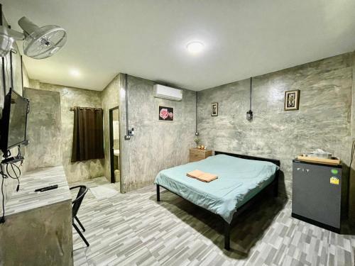 Bed, ดีต่อใจ รีสอร์ท เชียงม่วน Deetorjai Resort in Chiang Muan Bed, ดีต่อใจ รีสอร์ท เชียงม่วน Deetorjai Resort in Chiang Muan