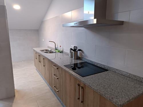 Kitchen, ALBERGUE VALIN LAMA in Palas de Rey Kitchen, ALBERGUE VALIN LAMA in Palas de Rey