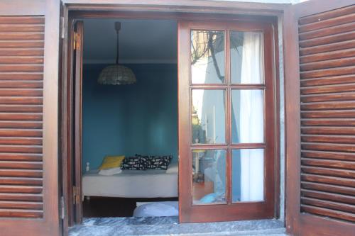 This photo about Ericeira Chill Hill Hostel & Private Rooms - Peach Garden shared on HyHotel.com