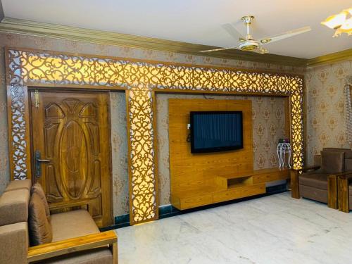 Shared lounge/TV area, Hotel Heaven Inn near Shahjalal International Airport Shared lounge/TV area, Hotel Heaven Inn near Shahjalal International Airport