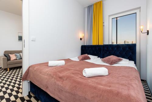 Central Business District Warsaw Apartments by Noclegi Renters