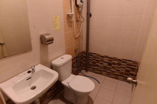 Ванная комната, Desaru Penawar Inn in Бандар Пенавар Ванная комната, Desaru Penawar Inn in Бандар Пенавар