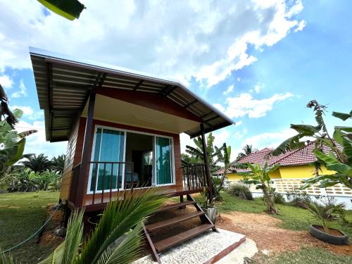Balcony/terrace, Rak Suan Homestay รักสวนโฮมสเตย์ in Pakarang Balcony/terrace, Rak Suan Homestay รักสวนโฮมสเตย์ in Pakarang