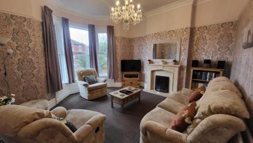 společenská místnost / TV salónek, STAY - at Southport Holiday Home - sleeps 6 in Southport společenská místnost / TV salónek, STAY - at Southport Holiday Home - sleeps 6 in Southport