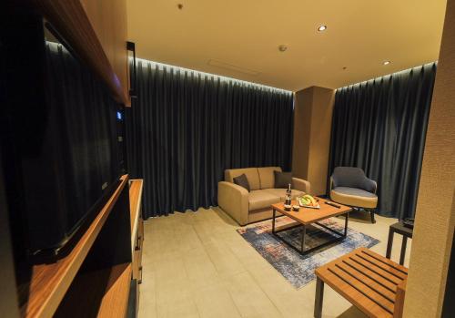 Zajednički dnevni boravak / prostorija s TV-om, The Kailyn Hotels&Suites Ataşehir (The Kailyn Hotels&Suites Atasehir) in Umraniye Zajednički dnevni boravak / prostorija s TV-om, The Kailyn Hotels&Suites Ataşehir (The Kailyn Hotels&Suites Atasehir) in Umraniye