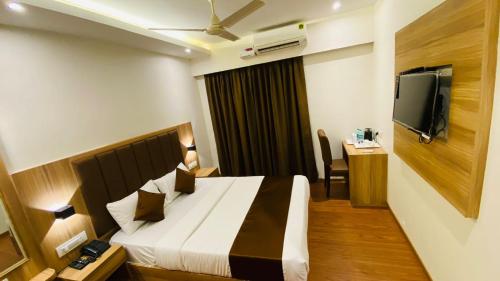Guestroom, Hotel Plaza Heights by RAK Rooms in Mangalore Guestroom, Hotel Plaza Heights by RAK Rooms in Mangalore