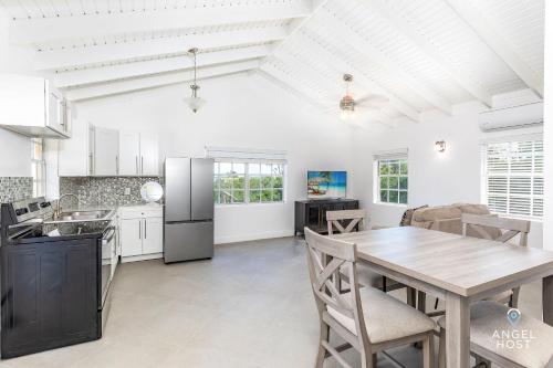 Cocina, Bright and Roomie Bottle Creek Apartments in Caicos del Norte Cocina, Bright and Roomie Bottle Creek Apartments in Caicos del Norte