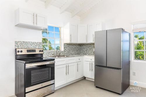 Cocina, Bright and Roomie Bottle Creek Apartments in Caicos del Norte Cocina, Bright and Roomie Bottle Creek Apartments in Caicos del Norte