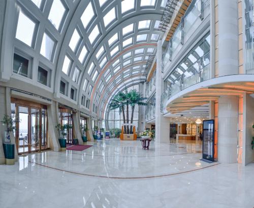 Lobi, Bayshore Hotel Dalian in Distrik Xing Hai Lobi, Bayshore Hotel Dalian in Distrik Xing Hai