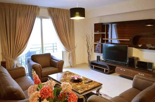 Közös társalgó / TV, Aminn Hotel in Laprake Közös társalgó / TV, Aminn Hotel in Laprake