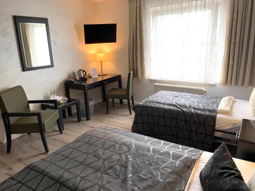 Boutique Hotel Goldene Henne in ใจกลางเมืองโวลฟ์สบวร์ค Boutique Hotel Goldene Henne in ใจกลางเมืองโวลฟ์สบวร์ค