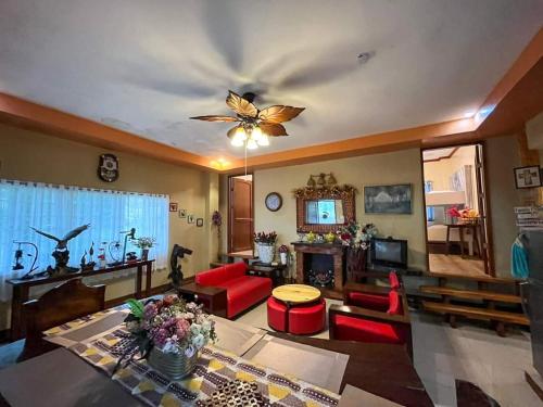 Shared lounge/TV area, Dahilayan Comfy Cabin in Malaybalay Shared lounge/TV area, Dahilayan Comfy Cabin in Malaybalay