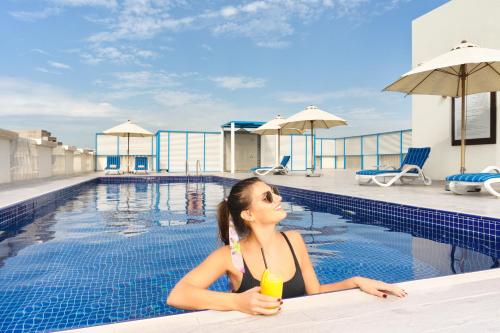 Swimming pool, The Manor by JA, Dubai in Jebel Ali Swimming pool, The Manor by JA, Dubai in Jebel Ali