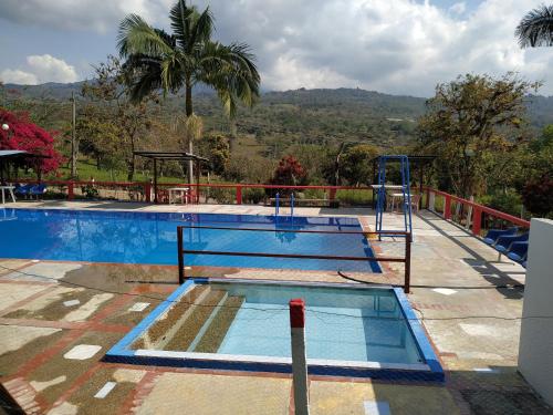 Swimming pool, Agradable casa de campo con piscina, campo de tejo in Tibana Swimming pool, Agradable casa de campo con piscina, campo de tejo in Tibana