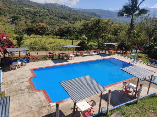 Swimming pool, Agradable casa de campo con piscina, campo de tejo in Tibana Swimming pool, Agradable casa de campo con piscina, campo de tejo in Tibana