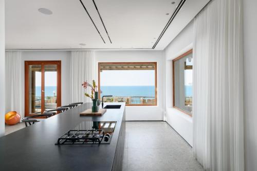 Kitchen, Luxury Villa over the Cliffs & Wild Beach by FeelHome in Netanya Kitchen, Luxury Villa over the Cliffs & Wild Beach by FeelHome in Netanya