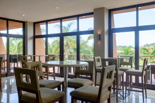 Restaurant, San Lameer Villa 2608 - 4 Bedroom Classic - 8 pax - San Lameer Rental Agency in Southbroom Restaurant, San Lameer Villa 2608 - 4 Bedroom Classic - 8 pax - San Lameer Rental Agency in Southbroom