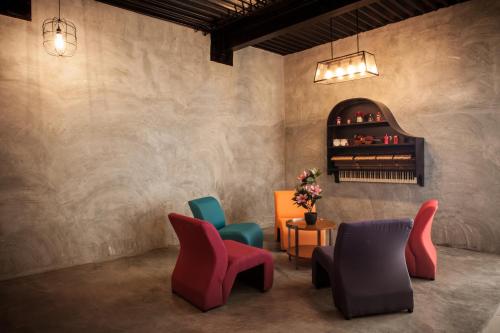 gedeelde lounge/tv-ruimte, Hotel Mezzo in Cheras gedeelde lounge/tv-ruimte, Hotel Mezzo in Cheras