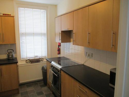 Kitchen, 3 Bed Flat - Sleeps 5 - Garden - Parking - Wifi in Ryde East Kitchen, 3 Bed Flat - Sleeps 5 - Garden - Parking - Wifi in Ryde East