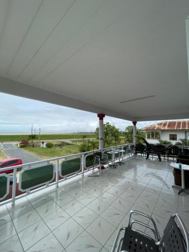 Terraza/balcón, Zeedijk Resort Nickerie in Nieuw Nickerie Terraza/balcón, Zeedijk Resort Nickerie in Nieuw Nickerie