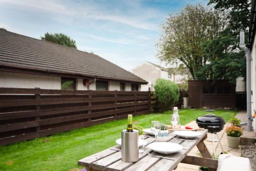 Garden, Rose Cottage - Seasgair Lodges in Carrbridge Garden, Rose Cottage - Seasgair Lodges in Carrbridge