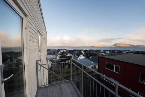 מרפסת, New Aparthotel / Panoramic sea view in Hoyvík מרפסת, New Aparthotel / Panoramic sea view in Hoyvík