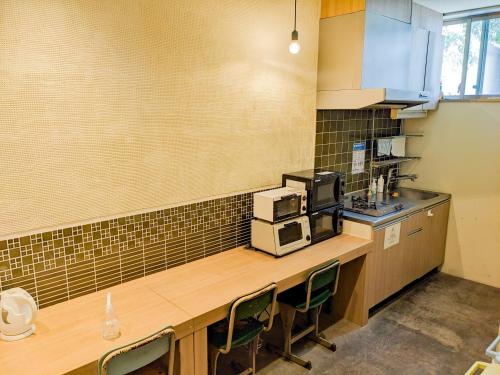 Kitchen, Hostel JIN near Nishi Kujo Train Station Kitchen, Hostel JIN near Nishi Kujo Train Station