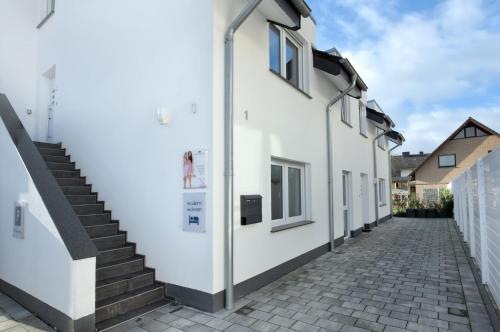 Exterior view, Modern Wohnen I Smart TV I Terrasse I 2x Parkplatz I 2 Schlafzimmer I 6 Schlafplatze in Bad Oeynhausen Exterior view, Modern Wohnen I Smart TV I Terrasse I 2x Parkplatz I 2 Schlafzimmer I 6 Schlafplatze in Bad Oeynhausen